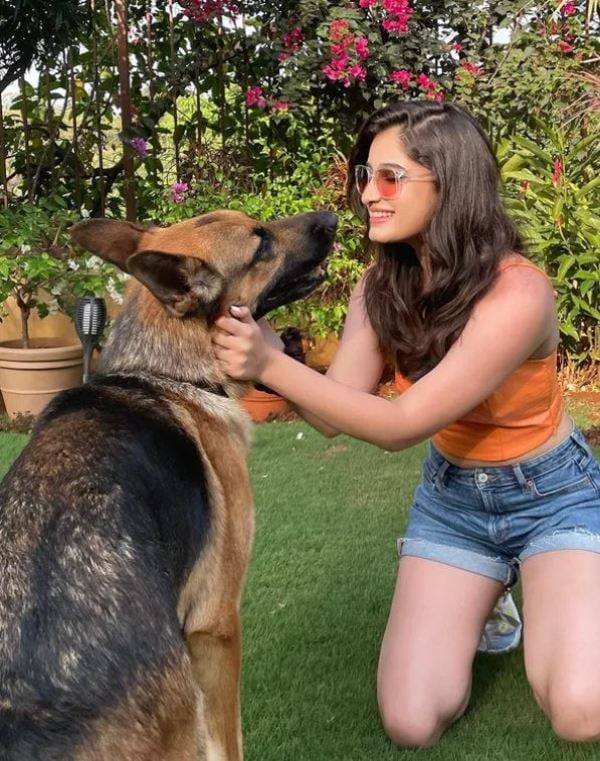 Rasha Thadani with a dog